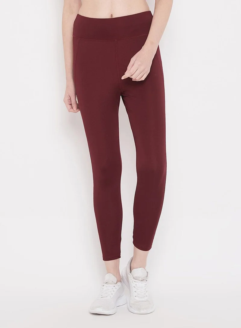 Clovia Red High Rise Activewear Tights in Maroon for Women | Best Price UAE